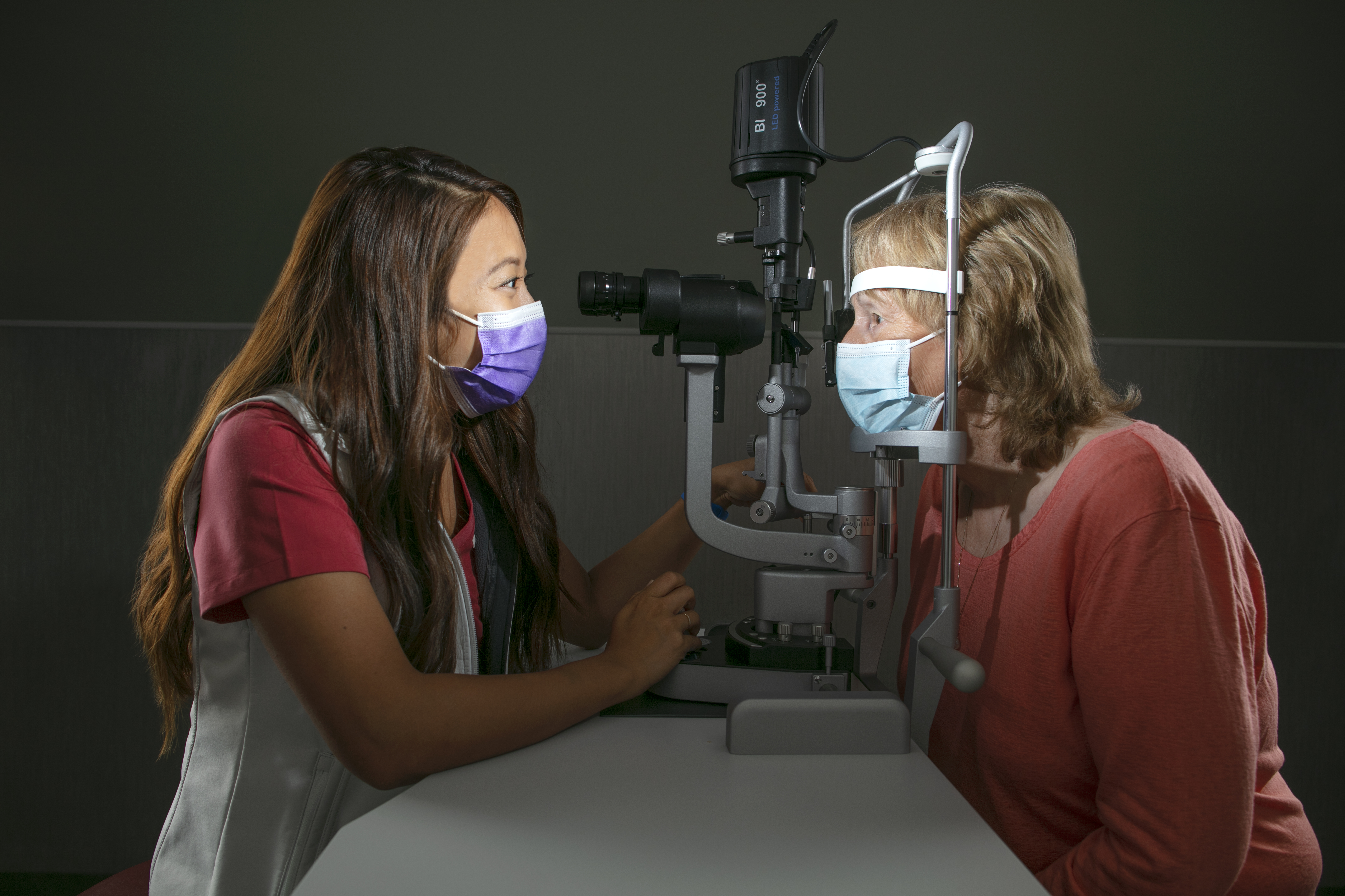 Betty Zheng performing an eye exam